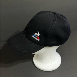 Le Coq Sportif Dark Cap with Iconic Rooster Logo